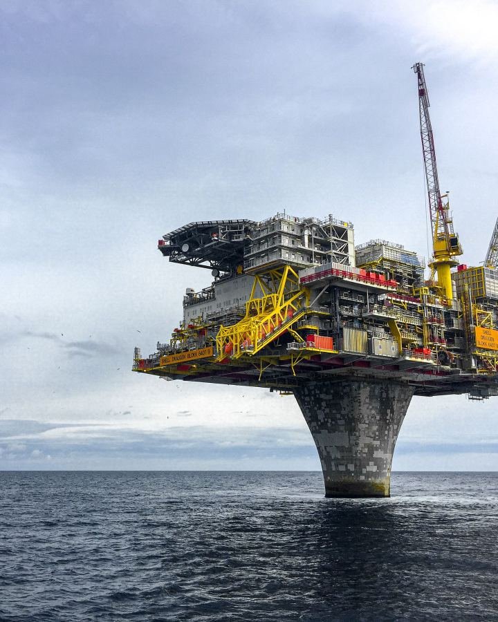 Offshore production platform with its helideck, standing in open water